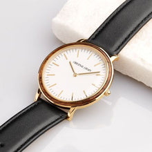 The Minimalist - Ebony/Gold/Black Leather Band ...